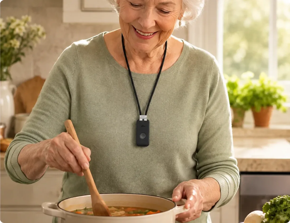 A woman wearing the DDD Pendant while relaxing at home.