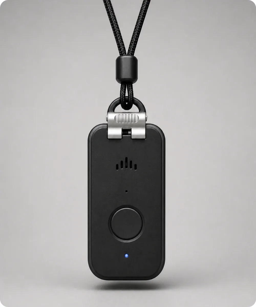 A person wearing the DDD Pendant on a lanyard.