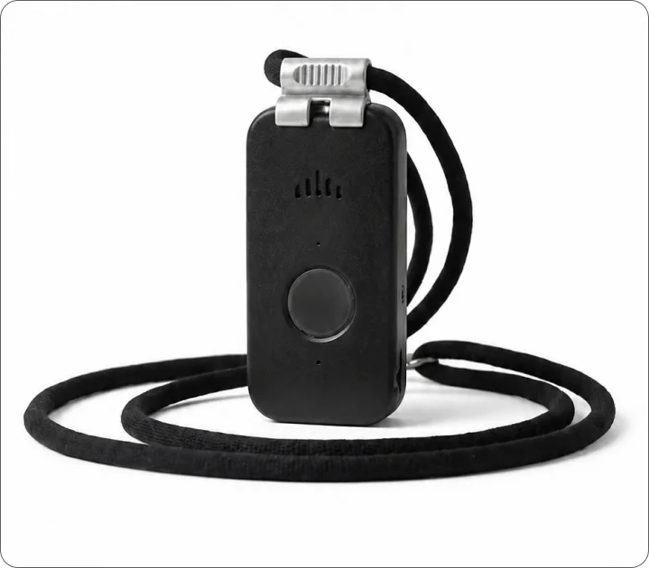 The DDD Pendant shown with its lanyard coiled beside it.