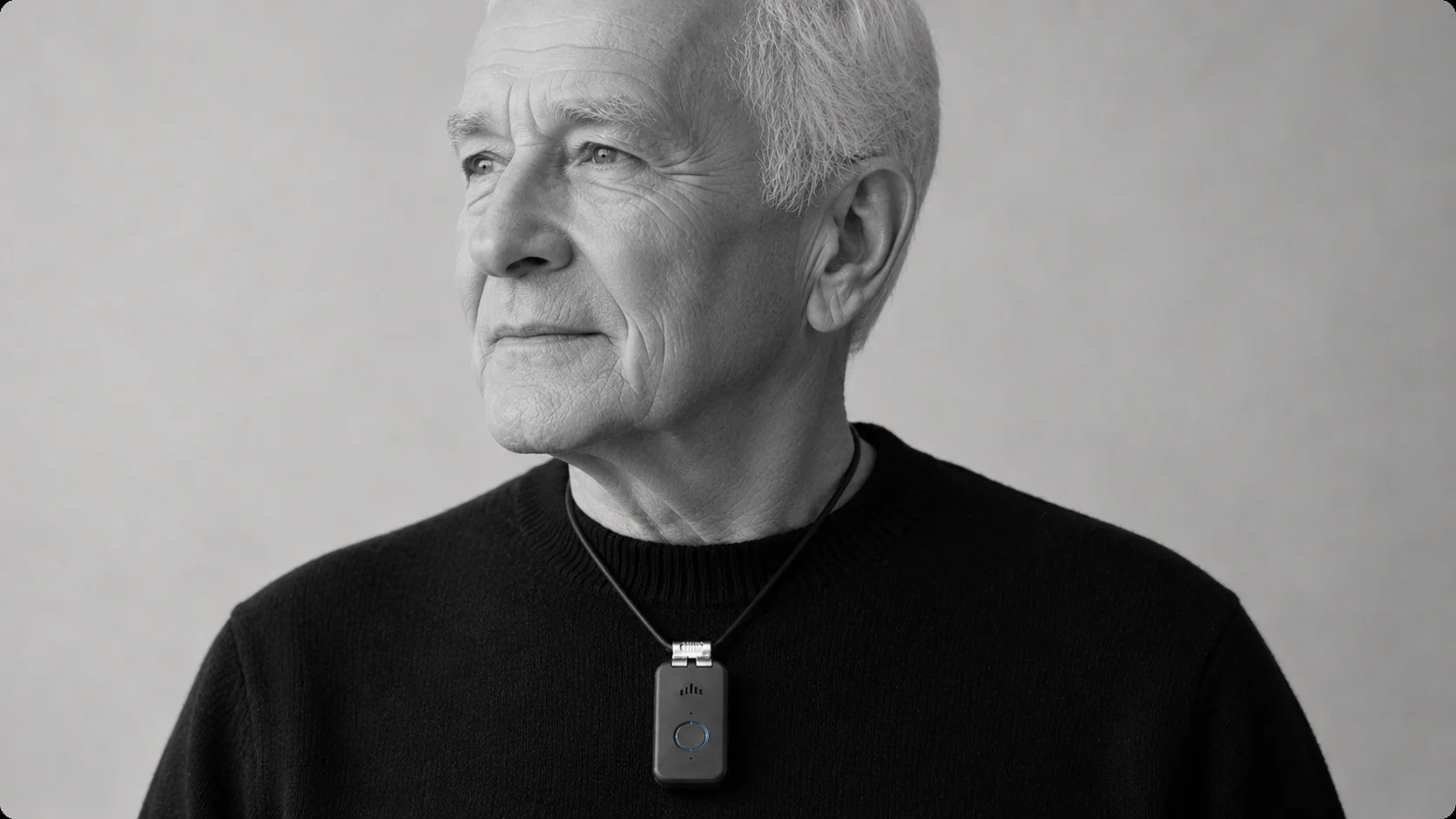 A man wearing the DDD pendant